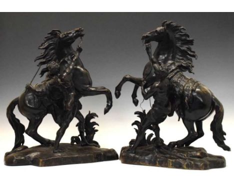 After Guillaume Coustou, (1677-1746) - Large pair of 19th Century bronze Marly Horses, 49.5cm highCondition report: One reins