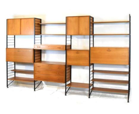 Robert Heal for Staples Ladderax - Ladderax four bay modular storage/display system, comprising three teak fall-front units, 