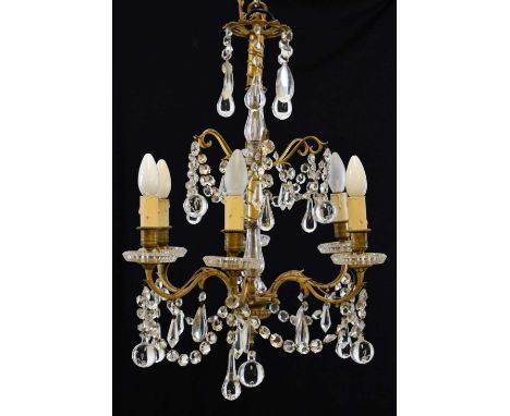 French ormolu and cut glass six-light chandelier by Baccarat, Paris, the central baluster stem issuing six branches, suspende