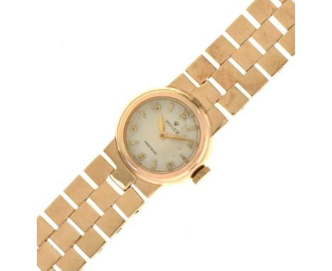 Rolex, Precision, a lady's 9ct gold mechanical bracelet watch, the white textured dial with gilt Arabic even numerals, batons