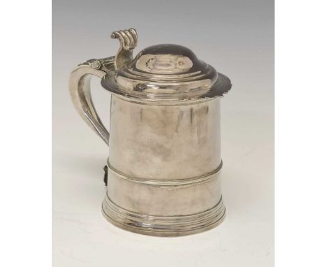 George I Britannia standard silver tankard of tapering cylindrical form with an applied reeded girdle and scroll handle, the 