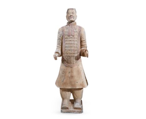 A CHINESE FIGURE OF A TERRACOTTA ARMY WARRIORLATE 20TH CENTURY 182.5cm high, 62cm wide, 36cm deep Provenance: Purchased The M