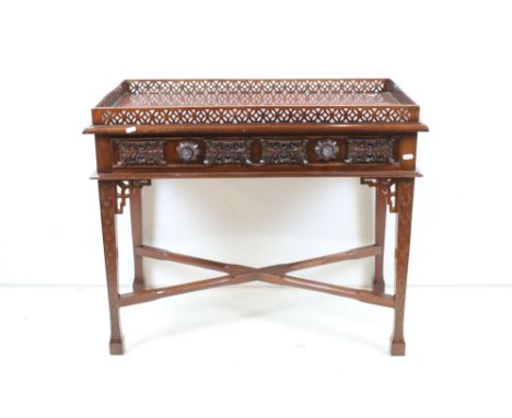 Chippendale style Mahogany Silver Table with pierced galleried top, carved single drawer and raised on square tapering legs u