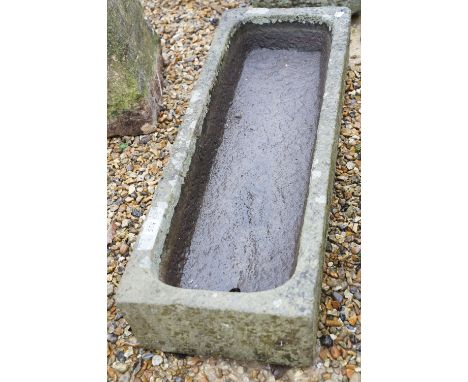 A garden stone trough planter of plain rectangular form. Measures approx 97cm wide. 