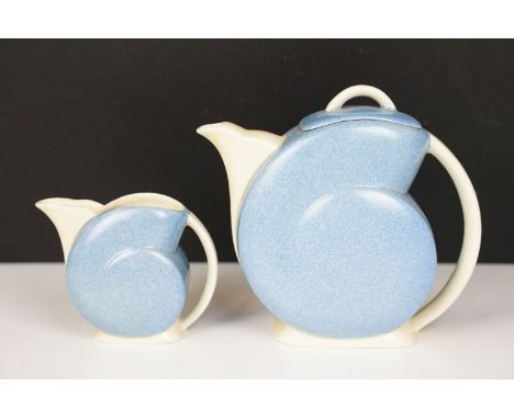 Clarice Cliff for Wilkinson Pottery ' Nautilus ' prototype teapot and jug, with mottled blue ground. Teapot approx 13cm tall 