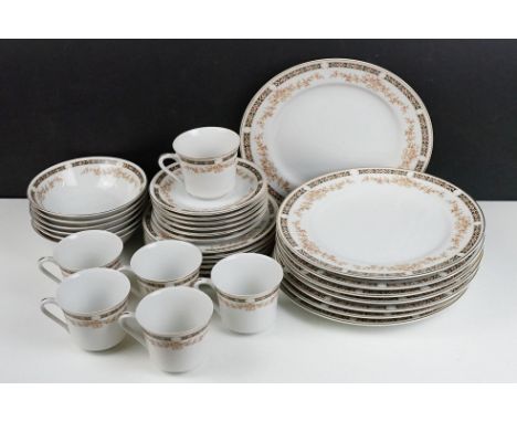 Japanese porcelain tea &amp; dinner service with floral garland decoration, pattern no. 2858A, to include 6 teacups &amp; sau