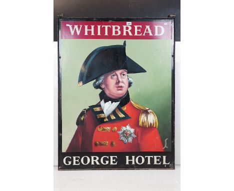 Large hanging Whitbread George Hotel sign featuring a hand painted portrait with printed lettering and black metal frame. Mea