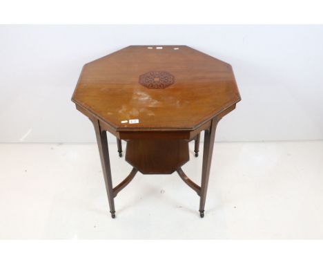 Early 20th century Walnut Inlaid Octagonal Centre Table, the four legs united by an under-shelf, 71cm high x 75cm wide 