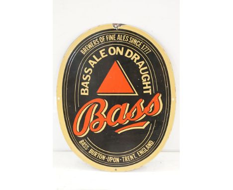 Bass on draught vintage advertising enamel sign, of oval form decorated with three enamel colours. measures 46 x 36cm. 