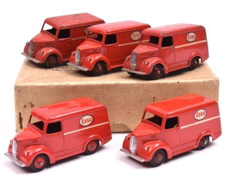 A rare Dinky Toys Trade Pack for 6 Trojan Van 31A 'ESSO'. Containing 5 examples in red with maroon wheels. The box is an exam