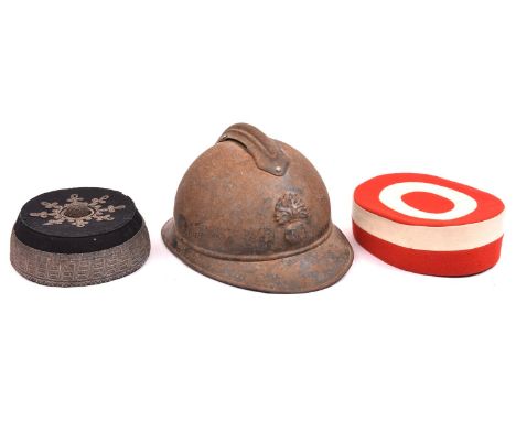 A French Adrian pattern steel helmet, bearing grenade with “RF” on ball (rusted, no lining); a Sandhurst Cadet scarlet/white 