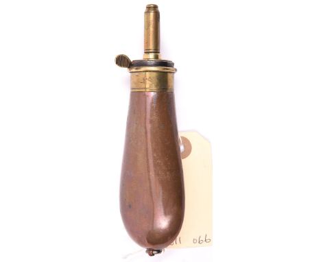 A copper bag shaped powder flask for Colt revolver,  plain body with ring to base, gilt top marked “Colts Pocket Flask” and “