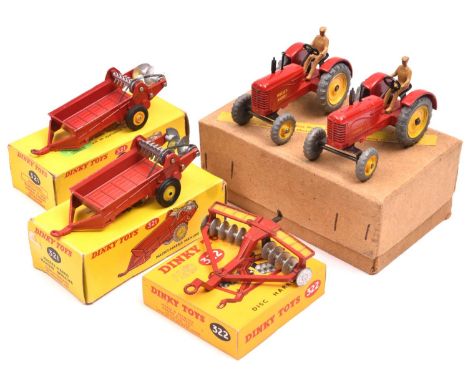 Dinky Toys farm items. A Trade Pack of 3 Massey-Harris Tractor 27A, containing 2 examples in red with yellow centred metal wh