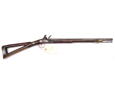A 20 bore flintlock coaching carbine by Wallace,     c 1785,  37” overall, barrel 22”, with break off breech; signed lock wit