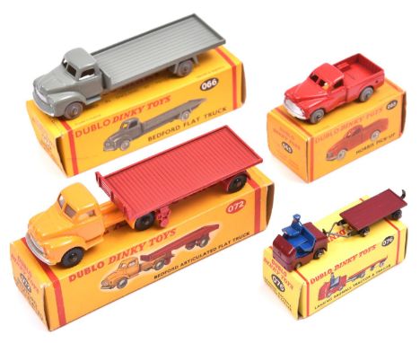 4 Dublo Dinky Toys. No.065 Morris Pick-Up in red with grey plastic wheels. No.066 Bedford Flat Truck in grey with smooth grey