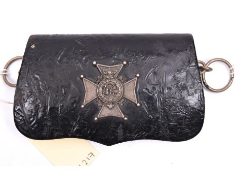 A Vic black PL pouch,  Maltese Cross flap badge with VR cypher in crowned Garter and motto to the centre, WM belt ring mounts