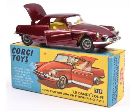 Corgi Toys 'Le Dandy' Coupe (259). A Citroen D.S. in metallic maroon with yellow interior, with wire wheels and black tyres. 