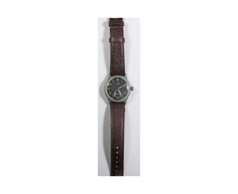 D marked Titus wristwatch. Serial D891542. Base metal case, no plating remaining, 32mm without crown. Springbars. Screw caseb