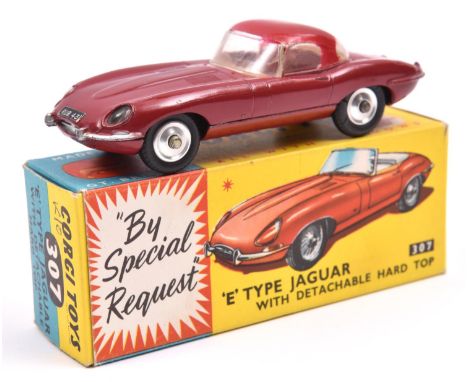 Corgi Toys 'E' Type Jaguar -with detachable hard top (307). An example in maroon with brown interior, complete with red plast