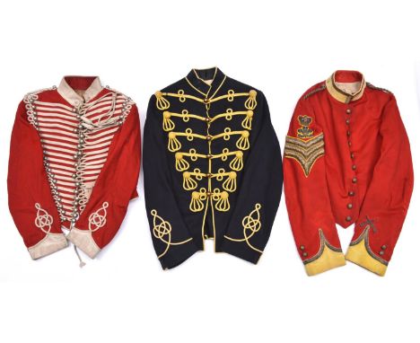 A Hussar OR’s full dress blue tunic, yellow cord edging, 6 loops with brass ball buttons to chest, Austrian knots to cuffs an