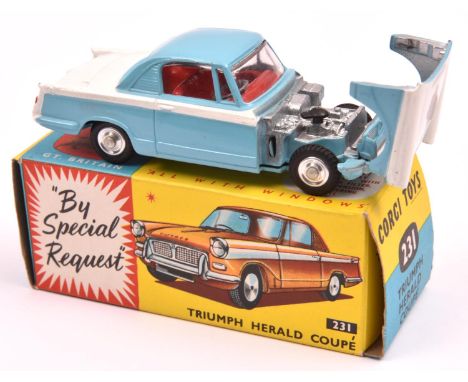 Corgi Toys Triumph Herald Coupe (231). Example in light blue and white, with red interior, dished wheels and black tyres. Box