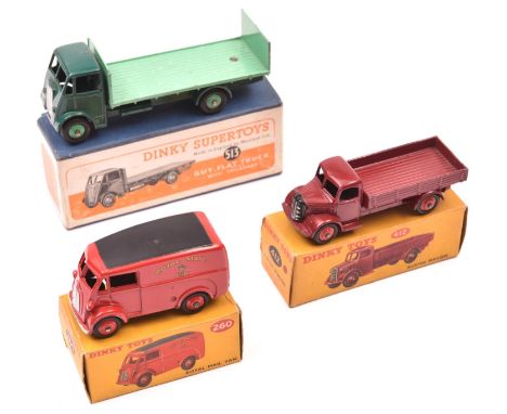 3 Dinky Toys. Guy Flat Truck with tailboard (513), dark green cab and chassis with mid green rear body and wheels. Royal Mail