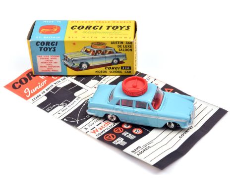 Corgi Toys Motor School Car (236). An Austin A60 in light blue with silver flash, red plastic wheel to roof and red interior,
