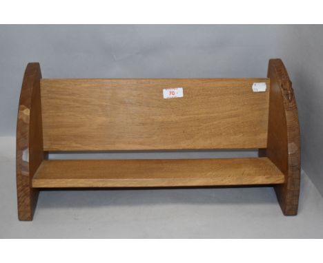 A oak book trough in the Robert Thompson styles having mouse to side.