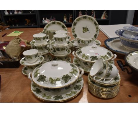 A large part dinner and breakfast service by Royal Worcester in the Worcester Hop design