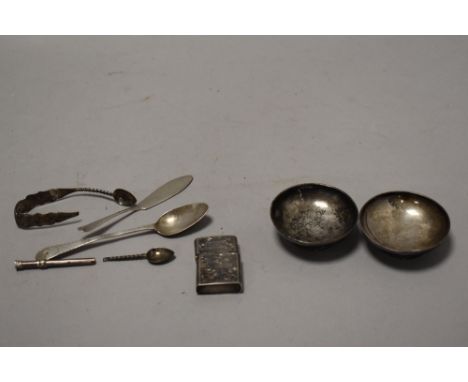 A silver-mounted cigarette lighter, silver butter knife and silver spoon, together with two Wellner-Soerne circular pin dishe