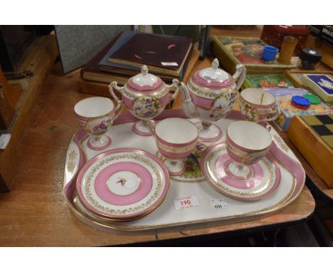 A Vienna porcelain tea service and tray set with birds of paradise design on pink ground
very minor wear to gilt in places, s