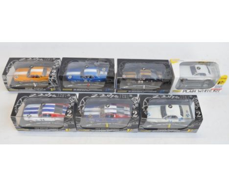 Seven 1/32 scale Ford Mustang slot car racing models from Pioneer to include PW-Kit#1 1968 Notchback Plain White (small crack