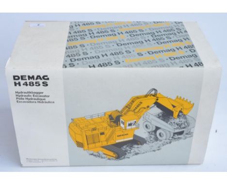 Boxed NZG 1/50 scale diecast Demag H485S Hydraulic Excavator model (Art No 357) in good condition, some minor paint chipping 