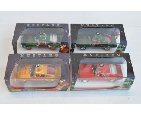 Four 1/32 scale 2017 edition Ford Mustang Festive Racers "Santa's 'Stang" slot car racing models from Pioneer to include limi