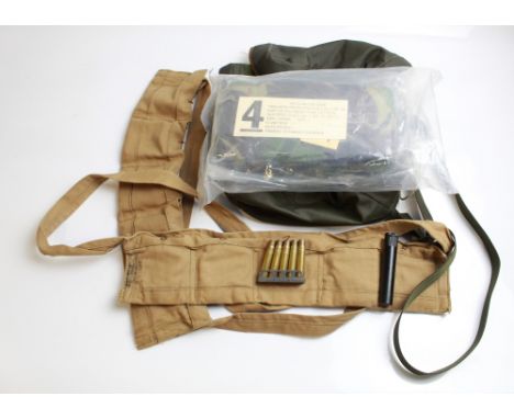 Two ammunition bandoliers containing 303 clips with brass casings, oil bottle, modern gas mask bag and a pair of N.B.C. trous