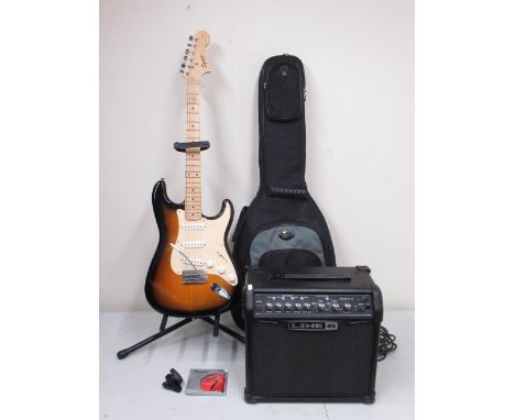 Squier Strat by Fender, Affinity Series sunburst electric guitar, Made in China, s/n CY100304360, with a Kinsman guitar stand