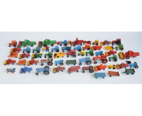 Collection of used small scale diecast tractors and other farm related machinery, mostly Lesney and Matchbox and a number of 