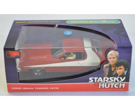 Scalextric 1/32 scale C2553 Ford Gran Torino 1976 Starsky & Hutch in as new unused condition with sealed spare braid pack 