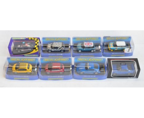 Eight 1/32 scale racing slot cars to include 4x Scalextric Mini Coopers (C3073, C2992, C2911 Nixon Associates No3 and limited