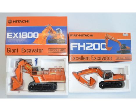 Two diecast Hitachi plant models from Shinsei, both with working metal tracks to include 1/60 scale EX1800 Giant Excavator in