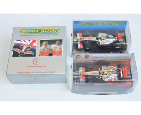 Three Scalextric 1/32 scale Lewis Hamilton McLaren Mercedes Formula 1 racing slot car models to include Commemorative limited