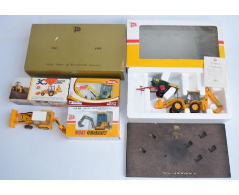 Joal 1/35 diecast JCB 50 Years Commemorative set with 4CX Backhoe Loader and Farm Trailer with moulded plastic display base a