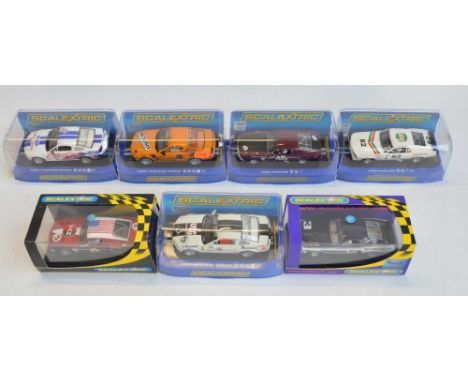 Seven 1/32 scale Ford Mustang slot car racing models from Scalextric to include C2545 "Modelzone" No3 (box good, no spare bra