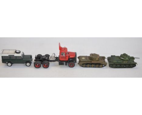 Four well built plastic model kits - 1/24 scale American Mack truck cab unit and long wheel base Land Rover, 1/35 scale Briti