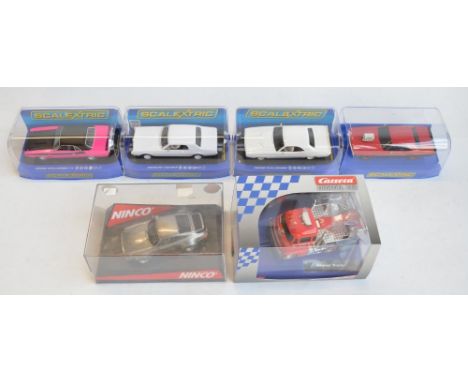 Six 1/32 scale racing slot car models to include Scalextric C3537 Dodge Challenger T/A 340 Six Pack (pink and black), C3443TF