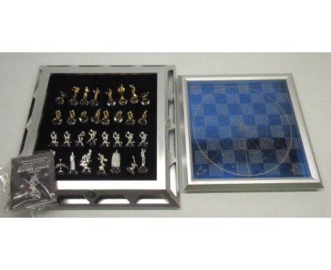 Franklin Mint - Star Trek  - 25th Anniversary Special Edition Chess Set, and a Franklin Mint Insignia display cabinet 