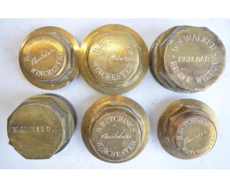 Collection of vintage brass coach and wheel nuts to include Austin, W M Kidd, B Hutchings and W M Walker stamped examples and