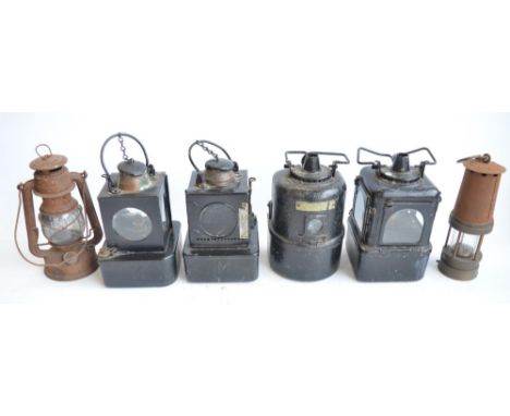 Six vintage metal lamps to include 4 railway lamps (2 marked BR(E) and 2 unmarked but one with 55/4 to top and the other 22/5
