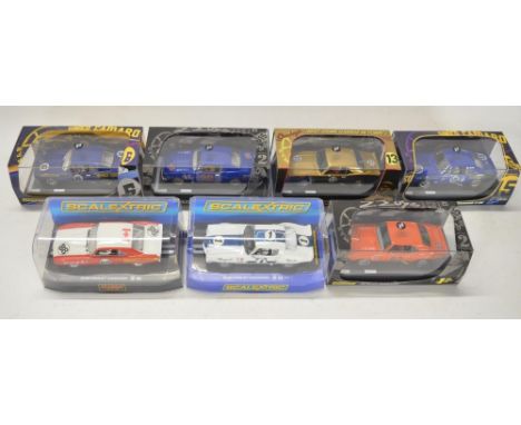 Seven 1/32 scale Chevy Camaro slot car racing models from Pioneer and Scalextric to include Pioneer P013 Pacific Team #23, P0