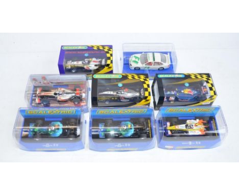 Seven Scalextric 1/32 scale Formula 1/Indy racing slot car models to include CC2817 Honda F1 No7, C2840 Honda F1 No8, C2864 R